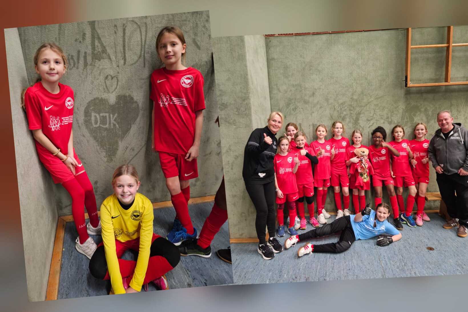 M&auml;dchen-Fu&szlig;ballmannschaft in roten Trikots posiert auf einer Sportfl&auml;che, daneben ein graues Wandbild mit Herzen.