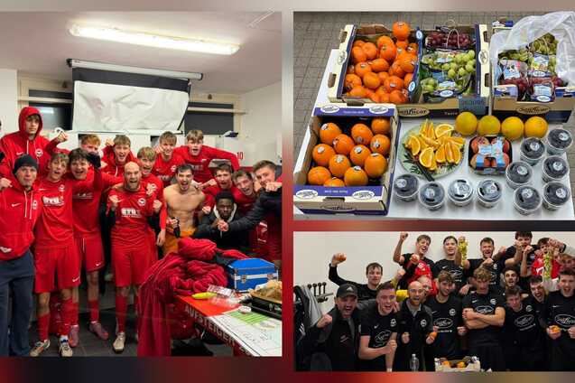 Gruppenfoto von jungen Fu&szlig;ballspielern in roten Trikots zusammen mit einer Auswahl an frischem Obst und Getr&auml;nken.