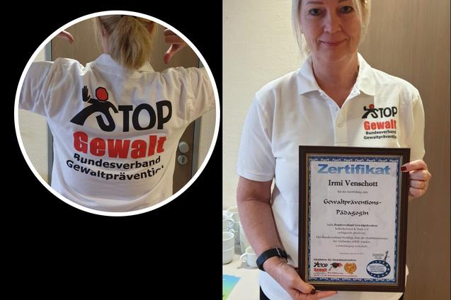 Frau h&auml;lt ein Zertifikat in der Hand, tr&auml;gt ein T-Shirt mit &bdquo;STOP Gewalt&ldquo; und zeigt auf den R&uuml;cken ihres Shirts.
