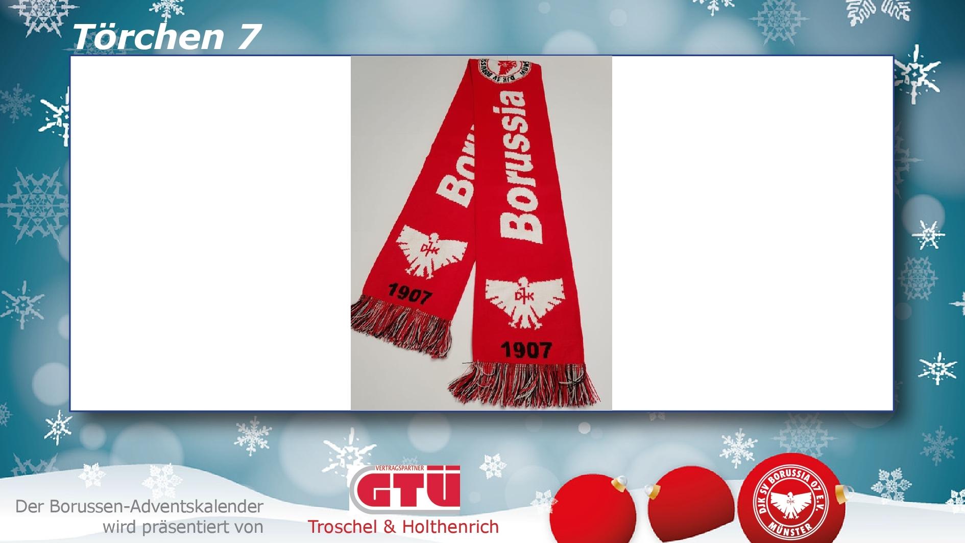 Roter Schal mit Aufdruck "Borussia" und Jahreszahl 1907, fransig, auf frostig blauem Hintergrund.