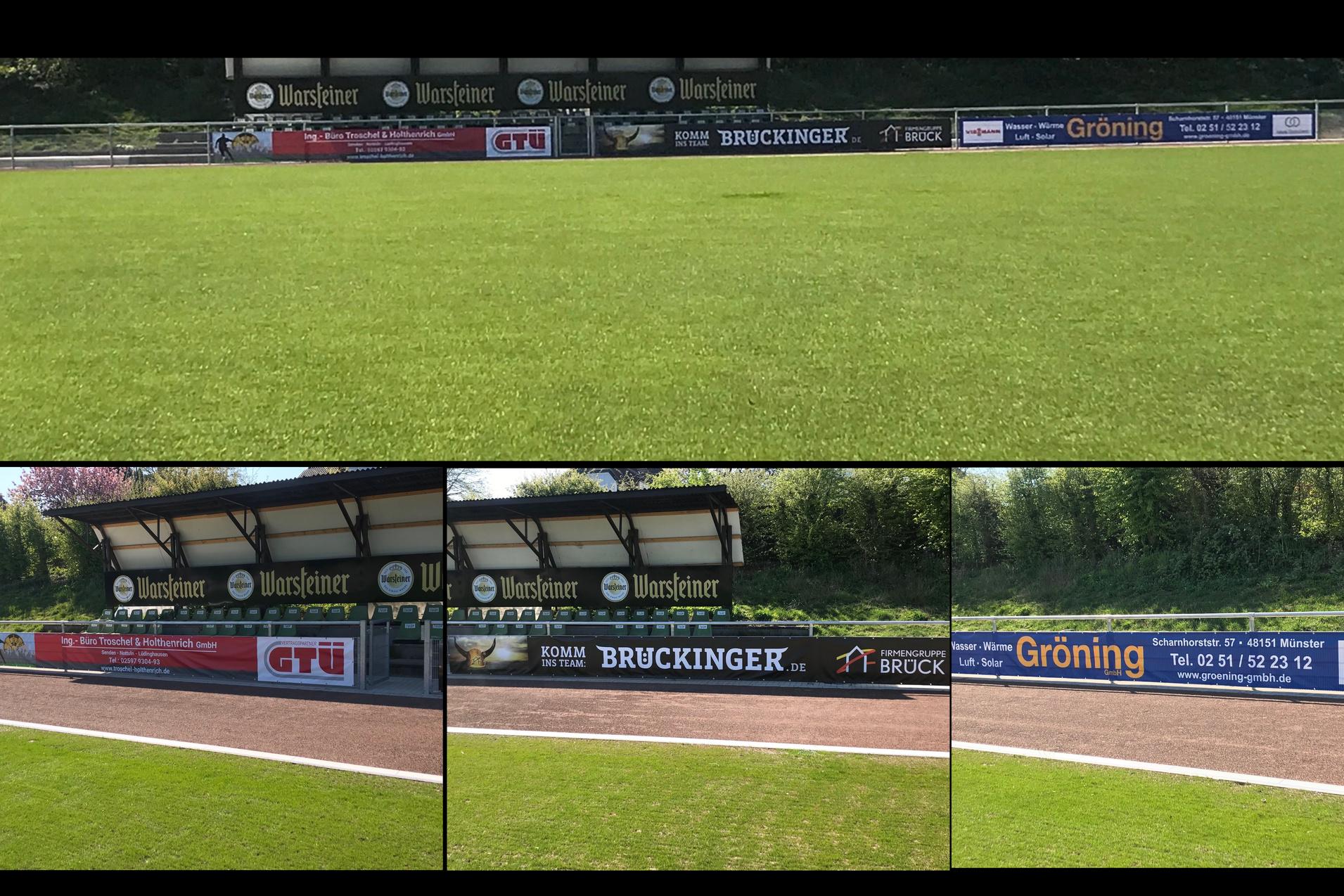 Gr&uuml;n bespielt Fu&szlig;ballfeld mit Sponsorenbannern am Rand, darunter GTU und Bruckinger, teilweise im Schatten.