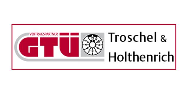 Logo der GT&Uuml; Troschel & Holthenrich mit Schriftzug &bdquo;Vertragspartner&ldquo; und abgebildetem Pr&uuml;fger&auml;t.